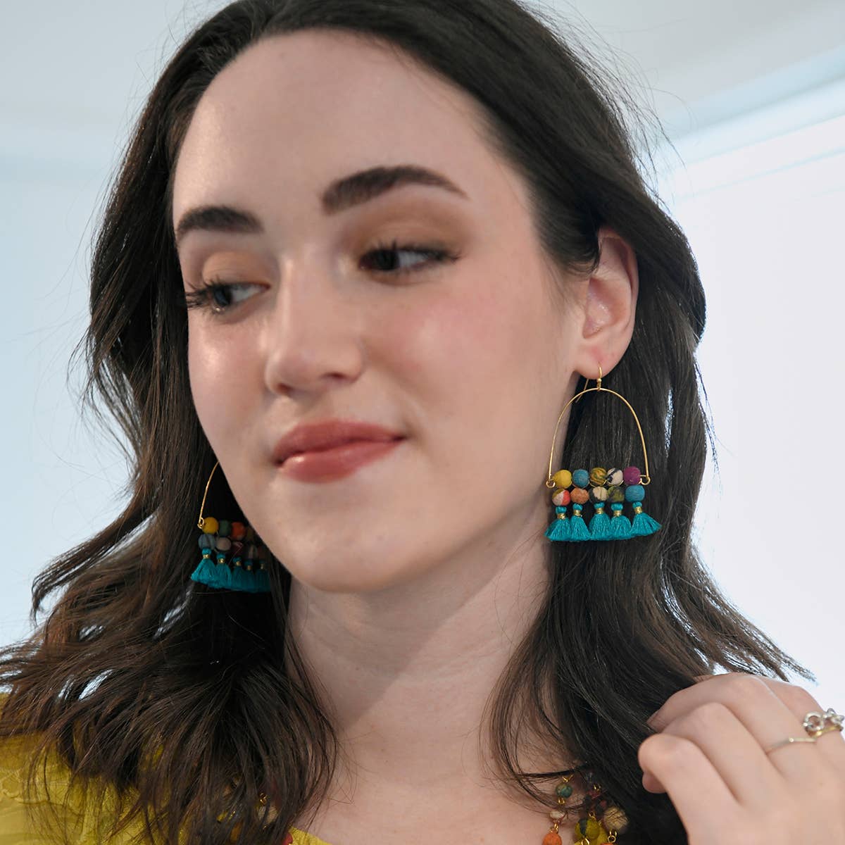 Arched Turquoise Tassel Earrings